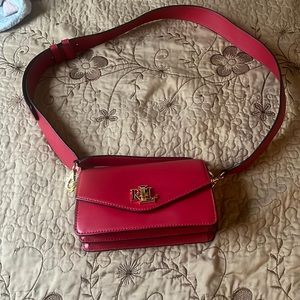 I’m selling Lauren Ralph bag brand new is red and even with little bag put bag